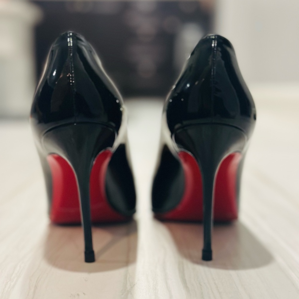 Classic black patent Christian Louboutin Decolette pumps 85 mm.